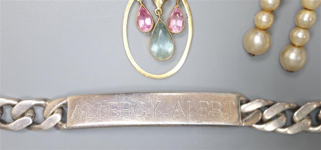 A modern 585 yellow metal and gem set drop oval pendant, gross n1.9 grams, on a 9ct gold chain, 2.6 grams & other jewellery.